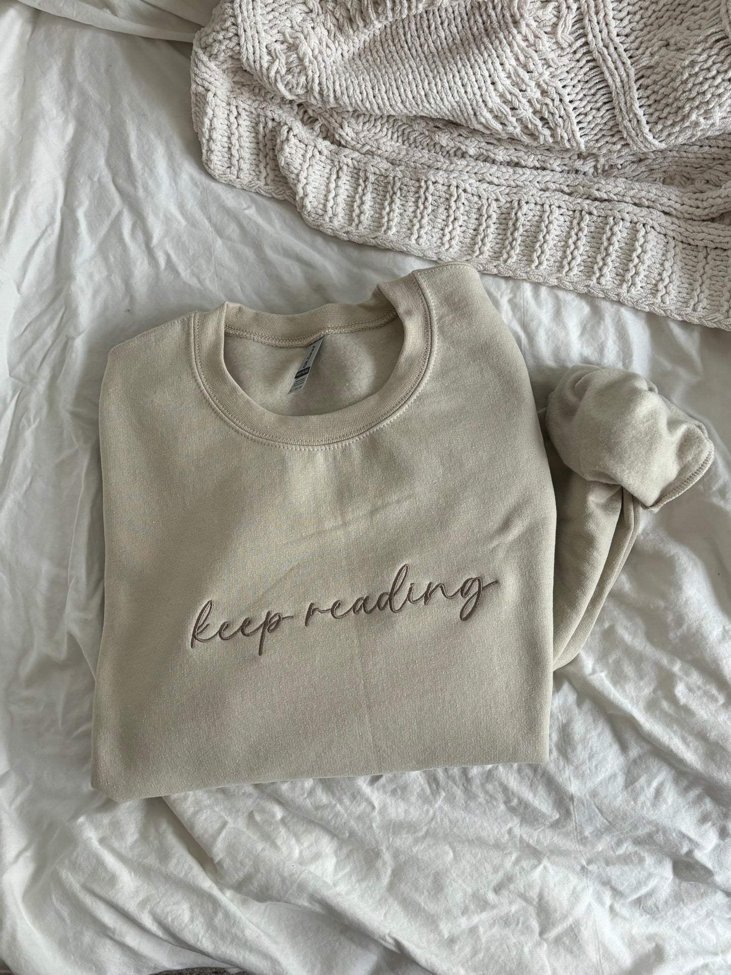 'Keep Reading' Embroidered Sweatshirt (Kate Stewart's LICENSED Ravenhood® Collection)