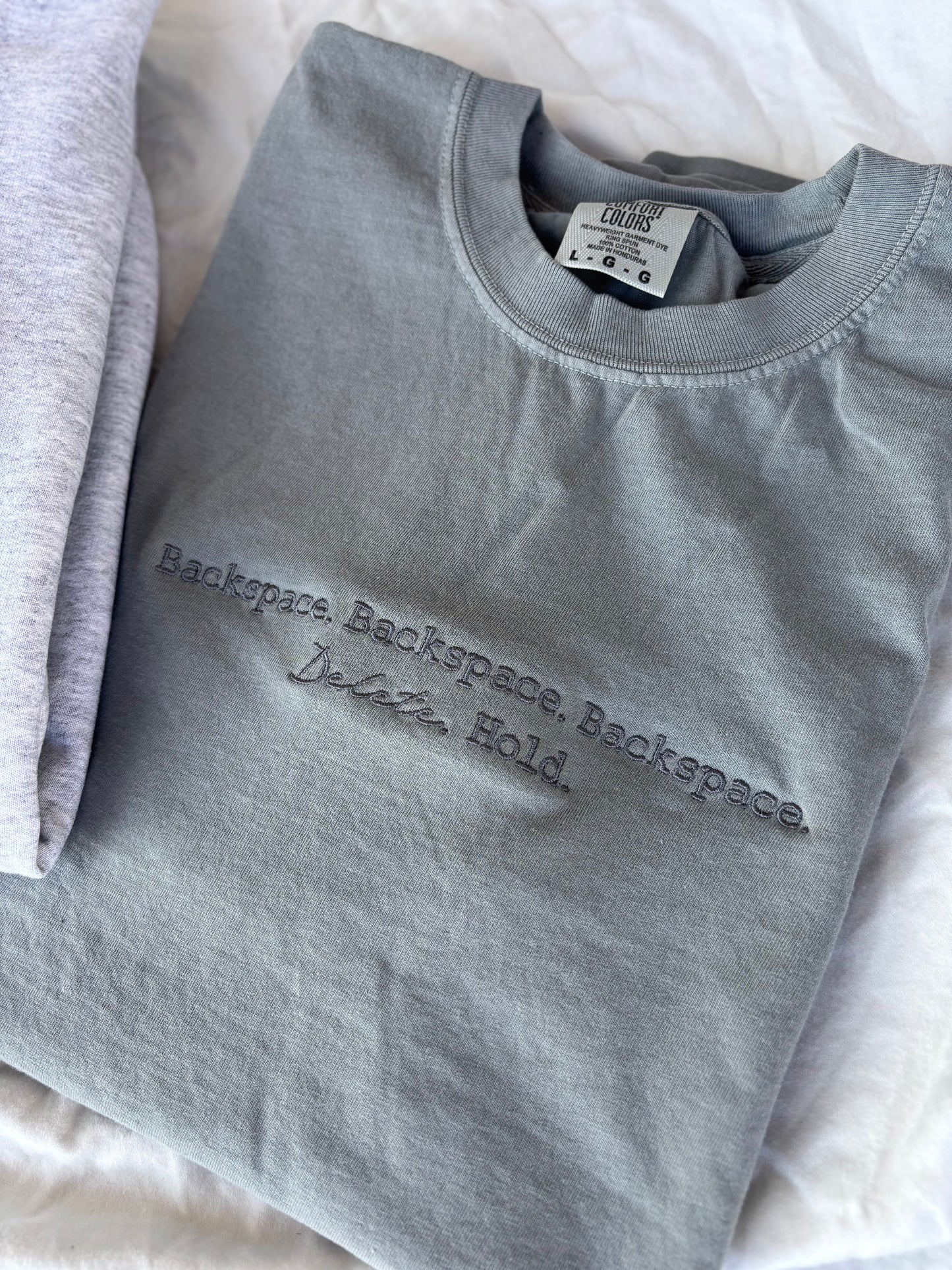 'Backspace.' Embroidered Design - Multiple Options (LICENSED Ravenhood® Legacy Collection)