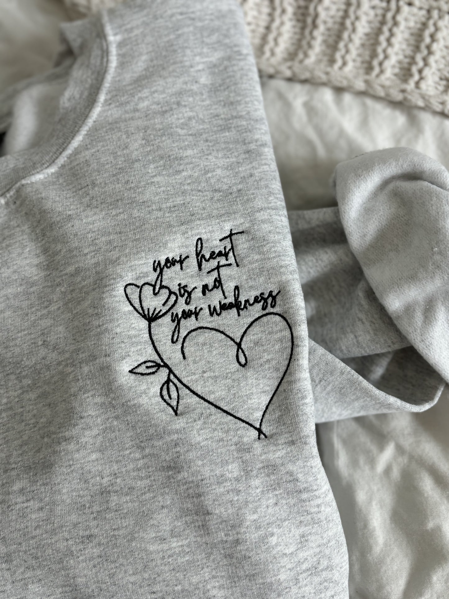 'Your heart is not your weakness' Embroidered Sweatshirt (Kate Stewart's LICENSED Ravenhood® Collection)