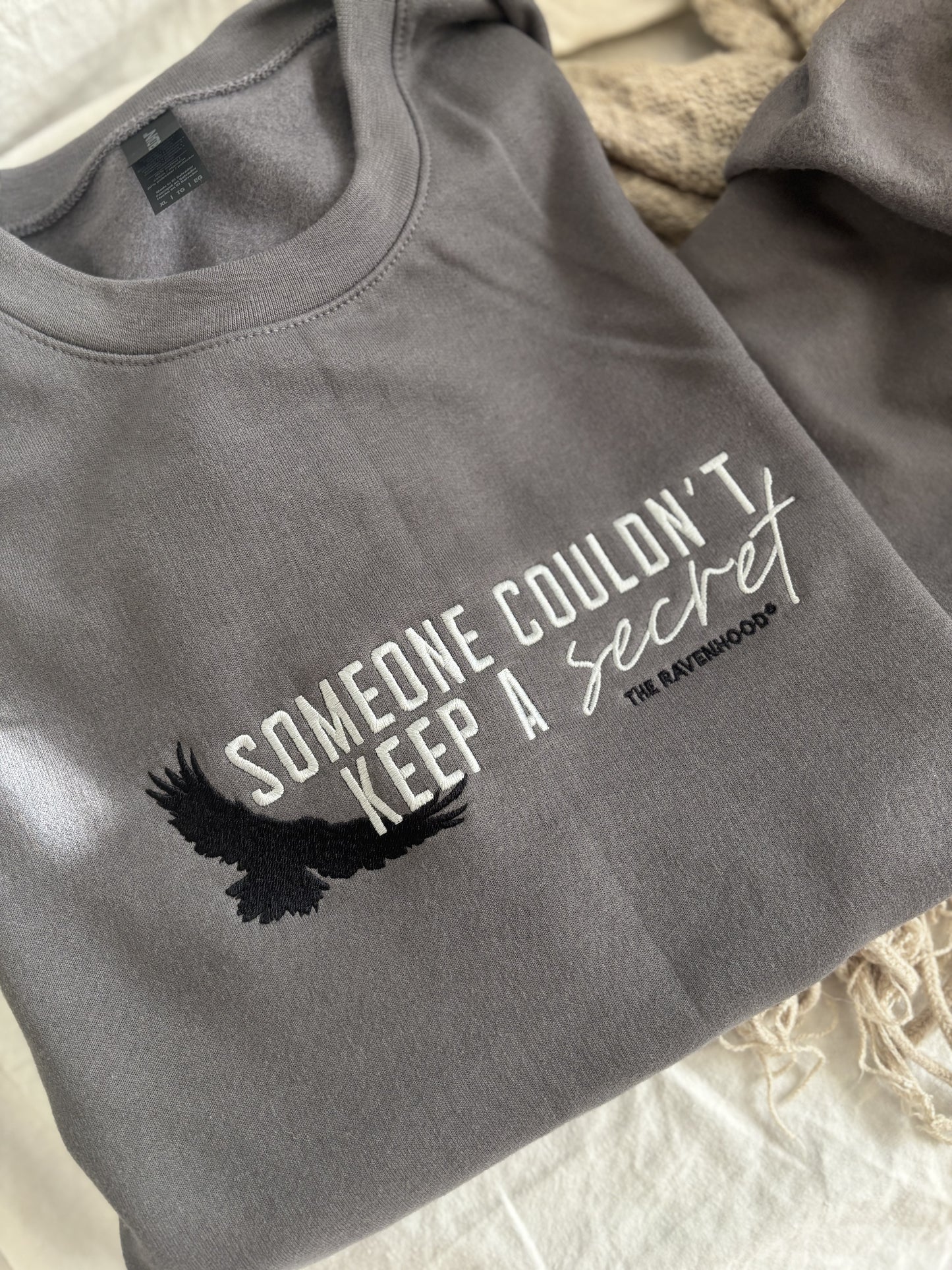 'Someone Couldn't Keep a Secret' Embroidered Sweatshirt (Kate Stewart's LICENSED Ravenhood® Collection)